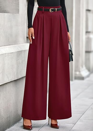 Women's pleated wide-leg trousers in rich wine red featuring a slimming drape silhouette, structured front pleats, and an adjustable belted waist.