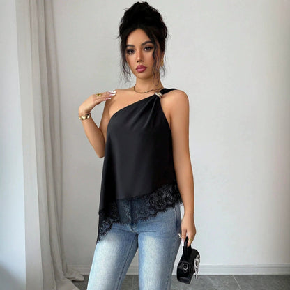Front view of black off-shoulder lace patchwork vest with metal buckle and irregular hem