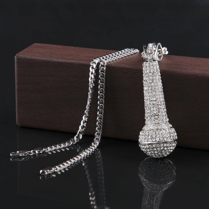 Hip-hop diamond-encrusted microphone necklaces.