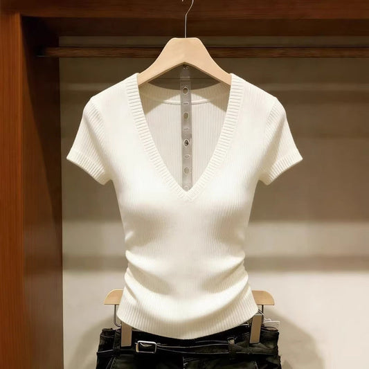 Women's white short-sleeve V-neck ice silk knit top featuring a slim-fit, ribbed hem, and lightweight textured finish, hanging on a wooden hanger.