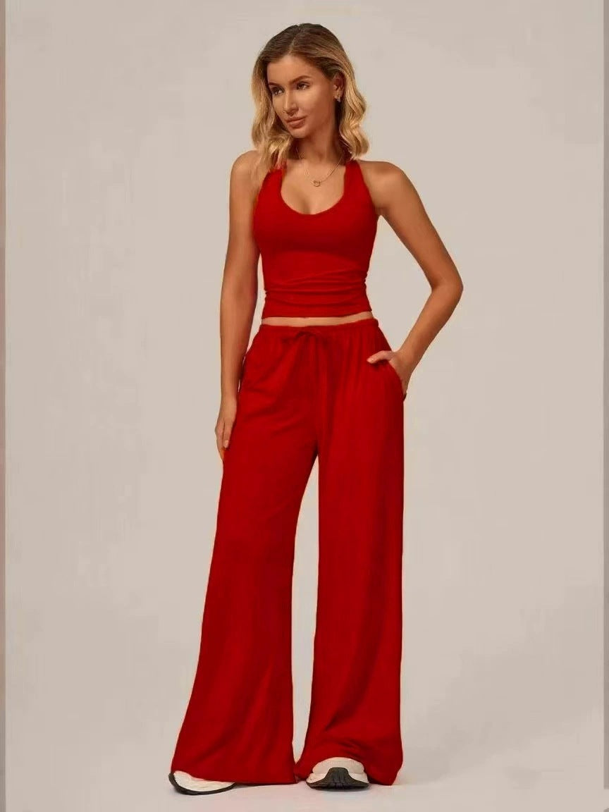Women's sporty crop tank and wide-leg pants set in red, full outfit front view