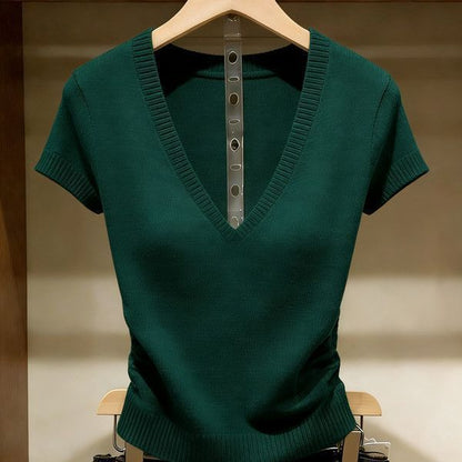 Women's green short-sleeve V-neck ice silk knit top featuring a slim-fit design, ribbed texture, and lightweight finish, hanging on a wooden hanger.