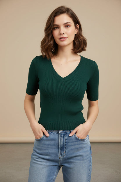 Women's green short-sleeve V-neck ice silk knit top featuring a slim-fit design, ribbed texture, and tucked into blue jeans, modeled outdoors.