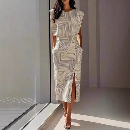 Model wearing an elegant apricot geometric printed sleeveless top and matching high-slit maxi skirt set with strappy heels.