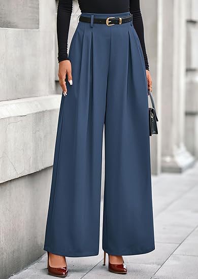 Women's pleated wide-leg trousers in dark blue featuring a slimming drape silhouette, structured front pleats, and an adjustable belted waist.