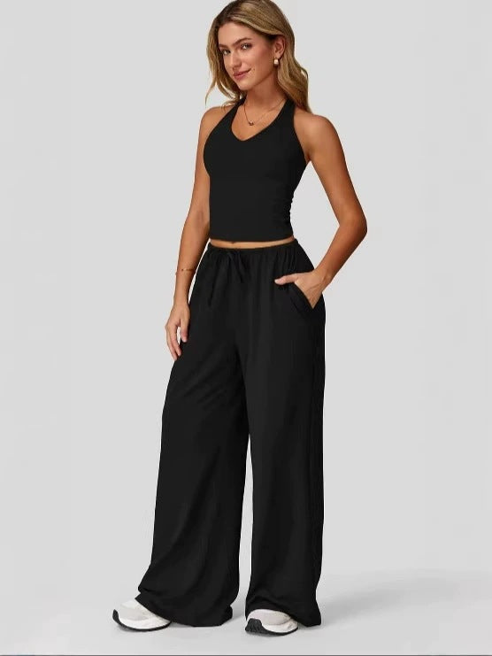 Women's sporty crop tank and wide-leg pants set in black, full outfit front view