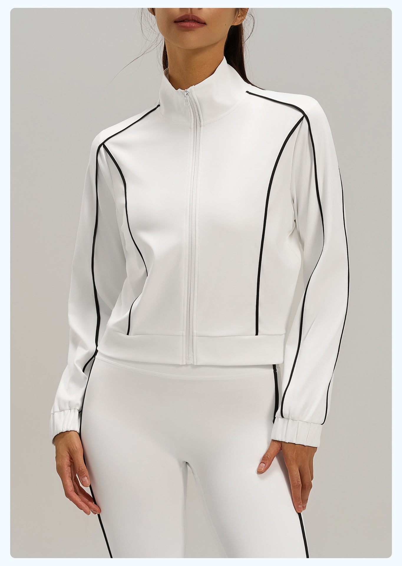 Women's white contrast stripe loose sports cardigan jacket paired with matching activewear leggings