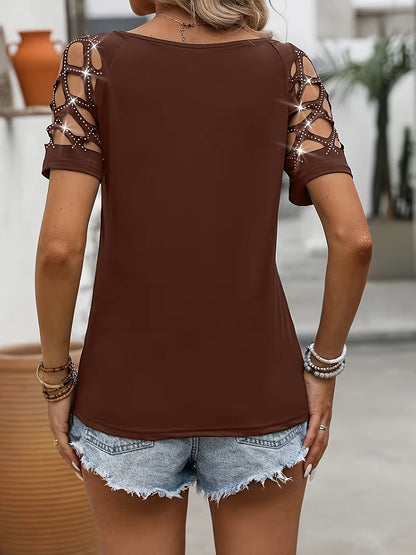 Brown short-sleeve top featuring rhinestone cut-out shoulders, a scoop back neckline, and a regular fit worn with denim shorts, viewed from the back.