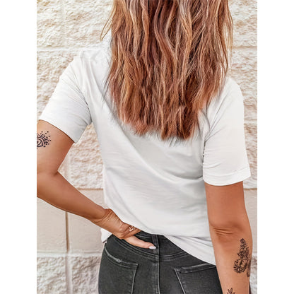 "Rear view of a woman wearing the casual white short-sleeve t-shirt and dark grey jeans, highlighting the plain back fit and style."