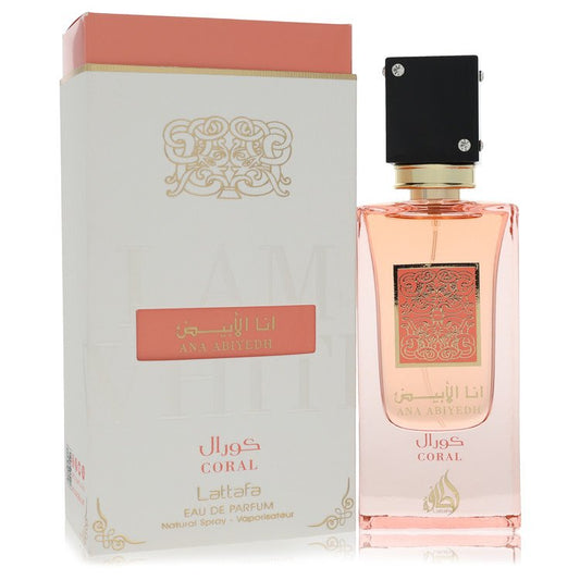 Ana Abiyed Coral by Lattafa Eau De Parfum bottle next to its matching peach and white packaging box.