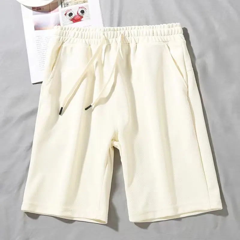 Trendy and Versatile Black Shorts for Boys Summer 2026 New Breathable Casual Five Quarter Pants Loose Straight Sports Pants
