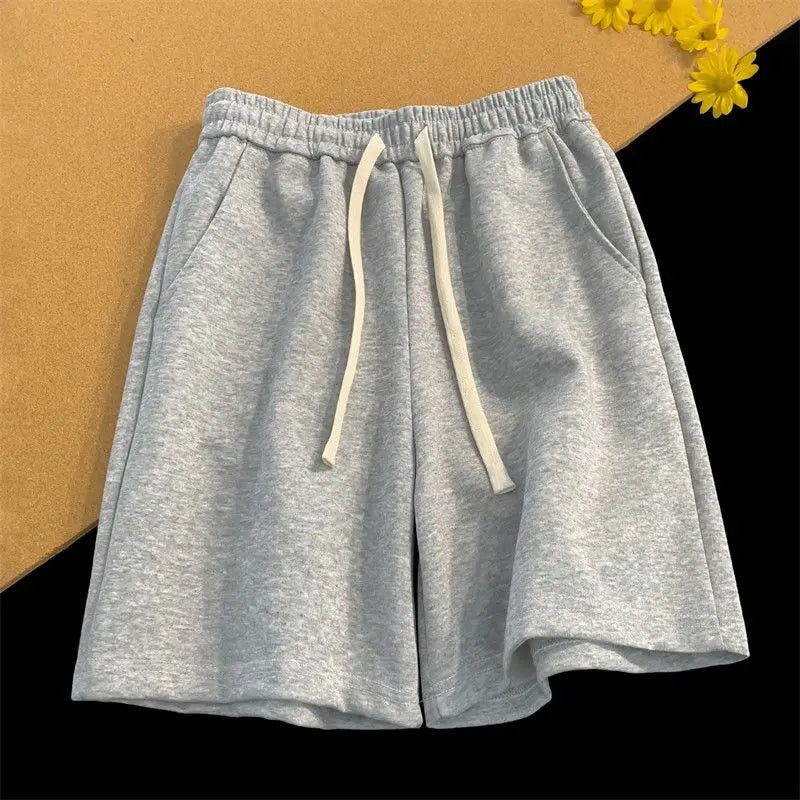 Trendy and Versatile Black Shorts for Boys Summer 2026 New Breathable Casual Five Quarter Pants Loose Straight Sports Pants