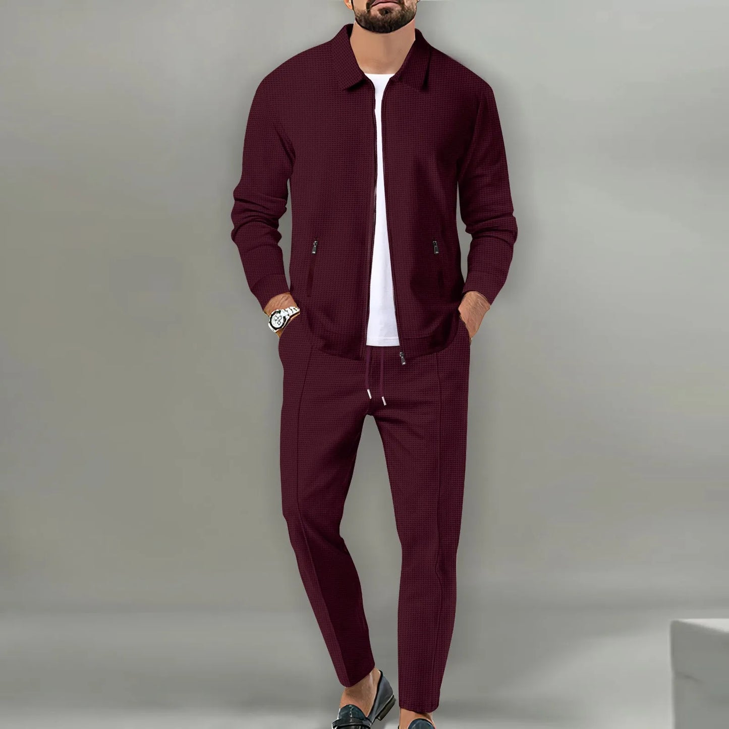 The new spring-autumn men's suit featuring a stylish waffle jacket and plain-colored trousers makes for a great casual outfit.