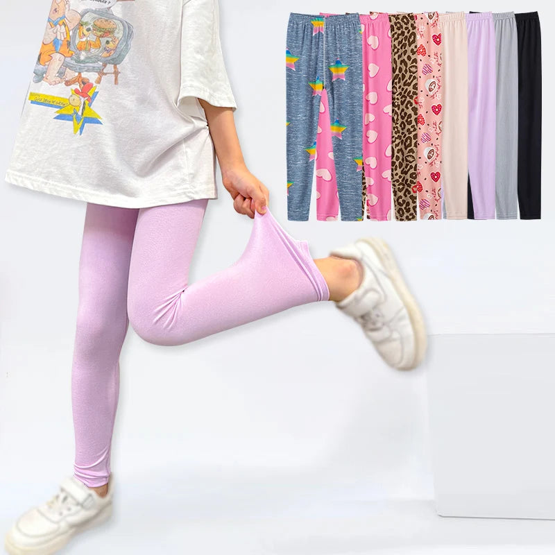 Girls four seasons thin leggings are comfortable, slim and cute. Printed pants for female students are simple and solid colors.
