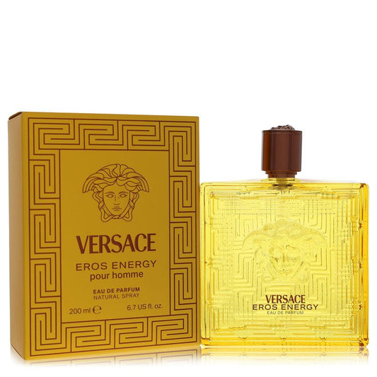 Versace Eros Energy Eau De Parfum Spray 6.7 oz bottle displayed upright next to its matching yellow and gold packaging box.