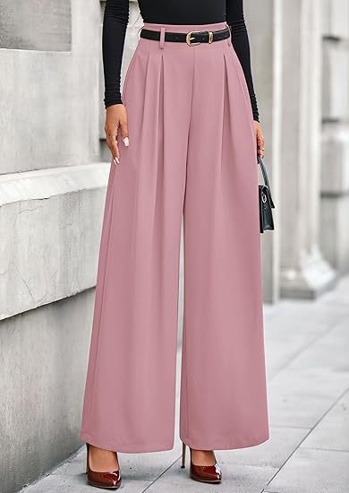 Women's pleated wide-leg trousers in pink featuring a slimming drape silhouette, structured front pleats, and an adjustable belted waist.