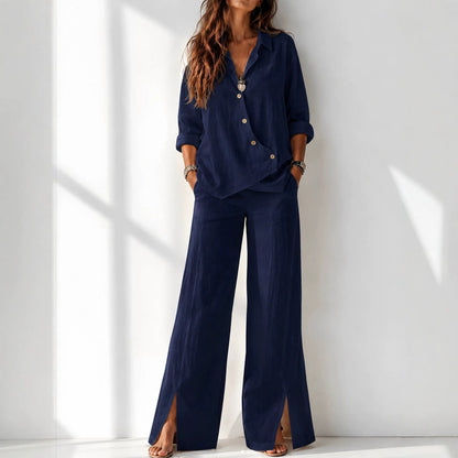 Women's asymmetrical long-sleeve top and wide-leg pants set in navy blue – full outfit front view showing relaxed boho silhouette