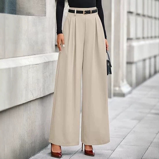 Women's pleated cropped pants in neutral beige featuring a slimming drape silhouette, adjustable waist, and structured pleats